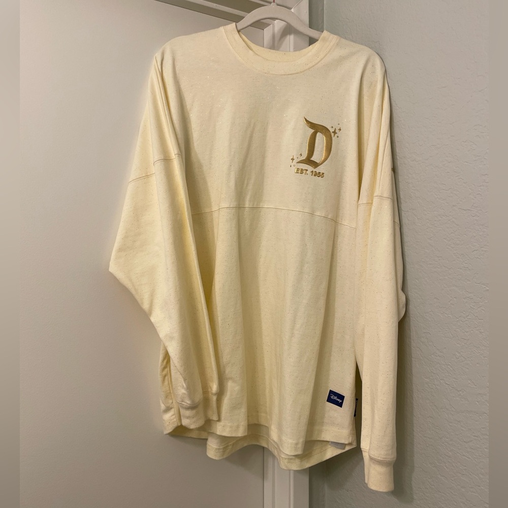 Disneyland Cream Glitter Spirit Jersey with Metallic Gold Accents